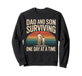 Dad And Son Surviving One Day Time Dad Sweatshirt - Unique Graphic Unisex - T-Shirt, Sweatshirt, Hoodie
