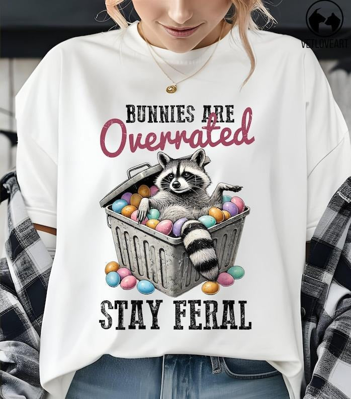 Bunnies Are Overrated Stay Feral Raccoon Easter Funny - Adult & Kids T-Shirts, Sweatshirts & Hoodies apparel design preview 1