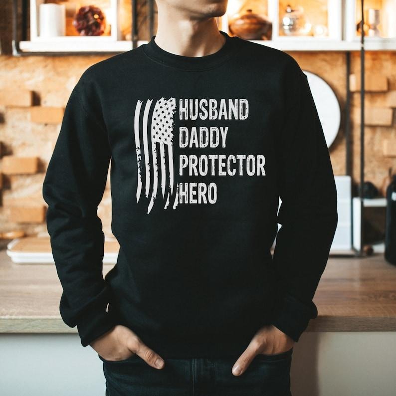 Dad USA Flag Husband Daddy Protector Hero Patriotic - Adult & Kids T-Shirts, Sweatshirts & Hoodies apparel design preview 1