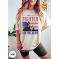 Donald Trump Shot American Fighter Fist Pumping - Adult & Kids T-Shirts, Sweatshirts & Hoodies apparel design preview 1