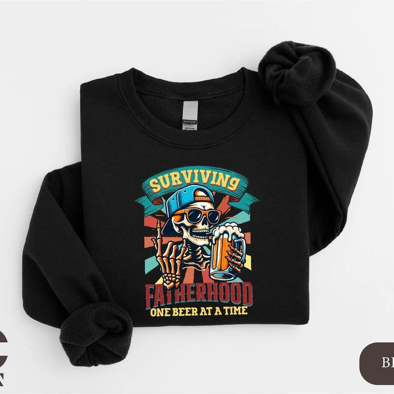 Fatherhood Skeleton Surviving One Beer Time Funny - Adult & Kids T-Shirts, Sweatshirts & Hoodies apparel design preview 1