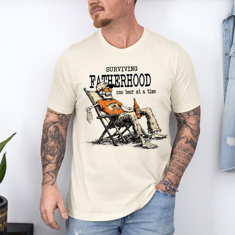 Funny Skeleton Dad Surviving Fatherhood One Beer Time - Adult & Kids T-Shirts, Sweatshirts & Hoodies apparel design preview 1
