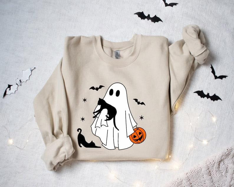 Ghost Holding Black Cat Halloween Fall Spooky Season - Adult & Kids T-Shirts, Sweatshirts & Hoodies apparel design preview 1