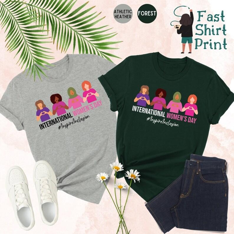 International Day Inspire Inclusion Strong - Adult & Kids T-Shirts, Sweatshirts & Hoodies apparel design preview 1