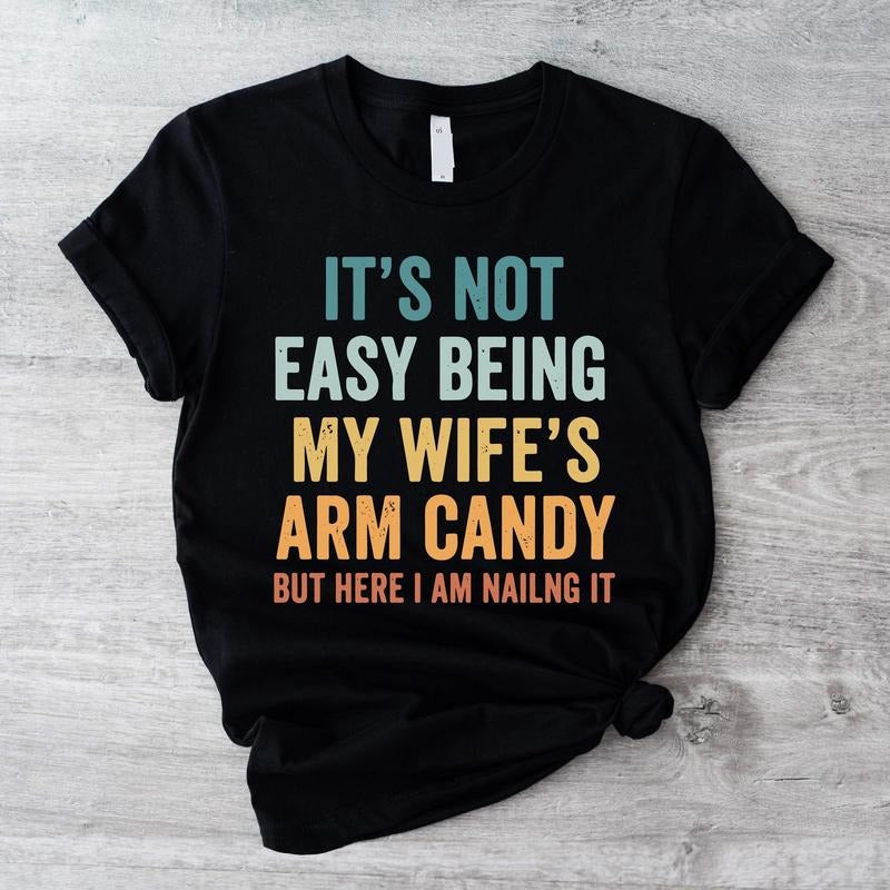'S Not Easy Being My Wife'S Arm Candy Funny Dad - Adult & Kids T-Shirts, Sweatshirts & Hoodies apparel design preview 1