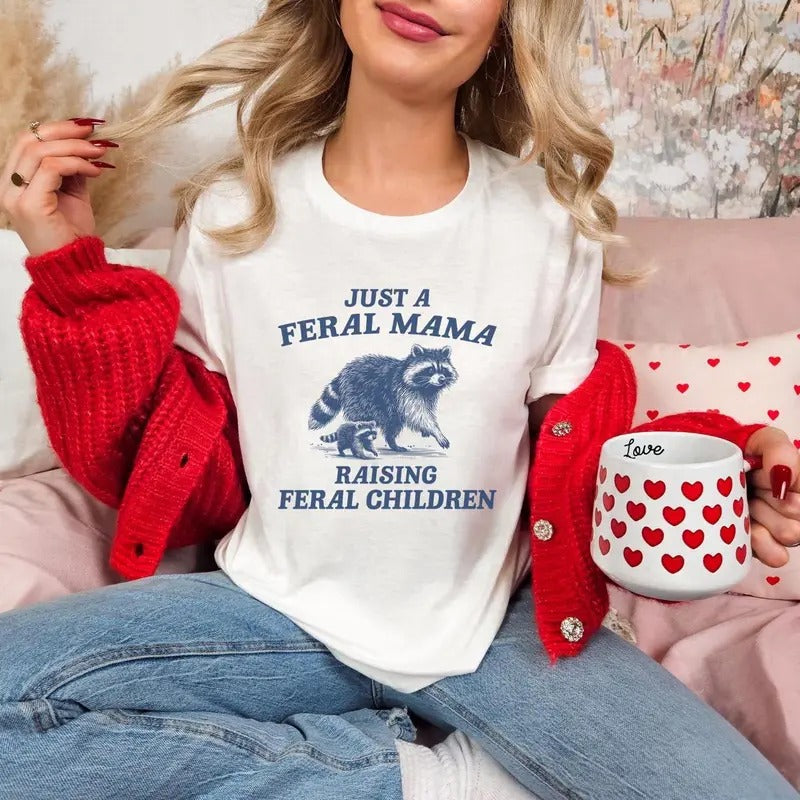 Just Feral Mama Raising Children Funny Mom Raccoon - Adult & Kids T-Shirts, Sweatshirts & Hoodies apparel design preview 1