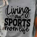 Living That Sports Mom Life Bella Canvas - Adult & Kids T-Shirts, Sweatshirts & Hoodies apparel design preview 1