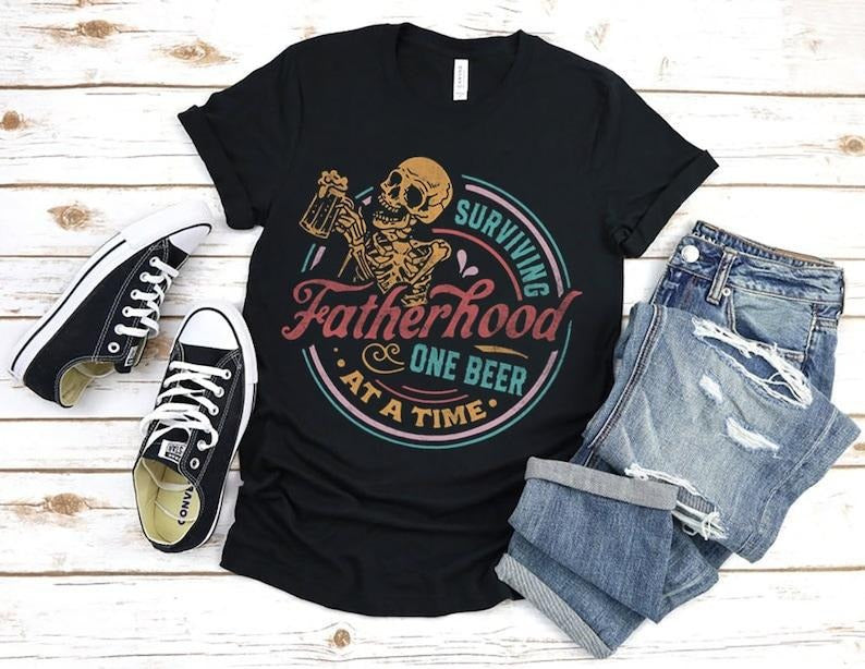 Funny Dad Surviving Fatherhood One Beer Time Fun - Adult & Kids T-Shirts, Sweatshirts & Hoodies apparel design preview 1
