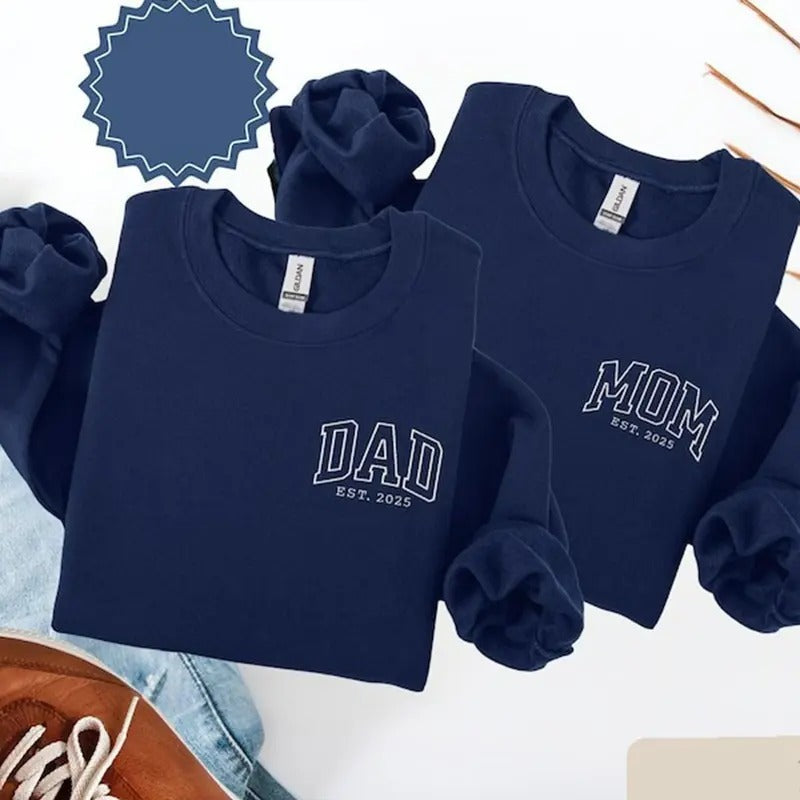Mom Dad Est Year New 2025 Pregnancy Reveal Be - Adult & Kids T-Shirts, Sweatshirts & Hoodies apparel design preview 1