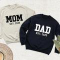 Mom Dad Est 2025 Pregnancy Announcement New Year Mama - Adult & Kids T-Shirts, Sweatshirts & Hoodies apparel design preview 1