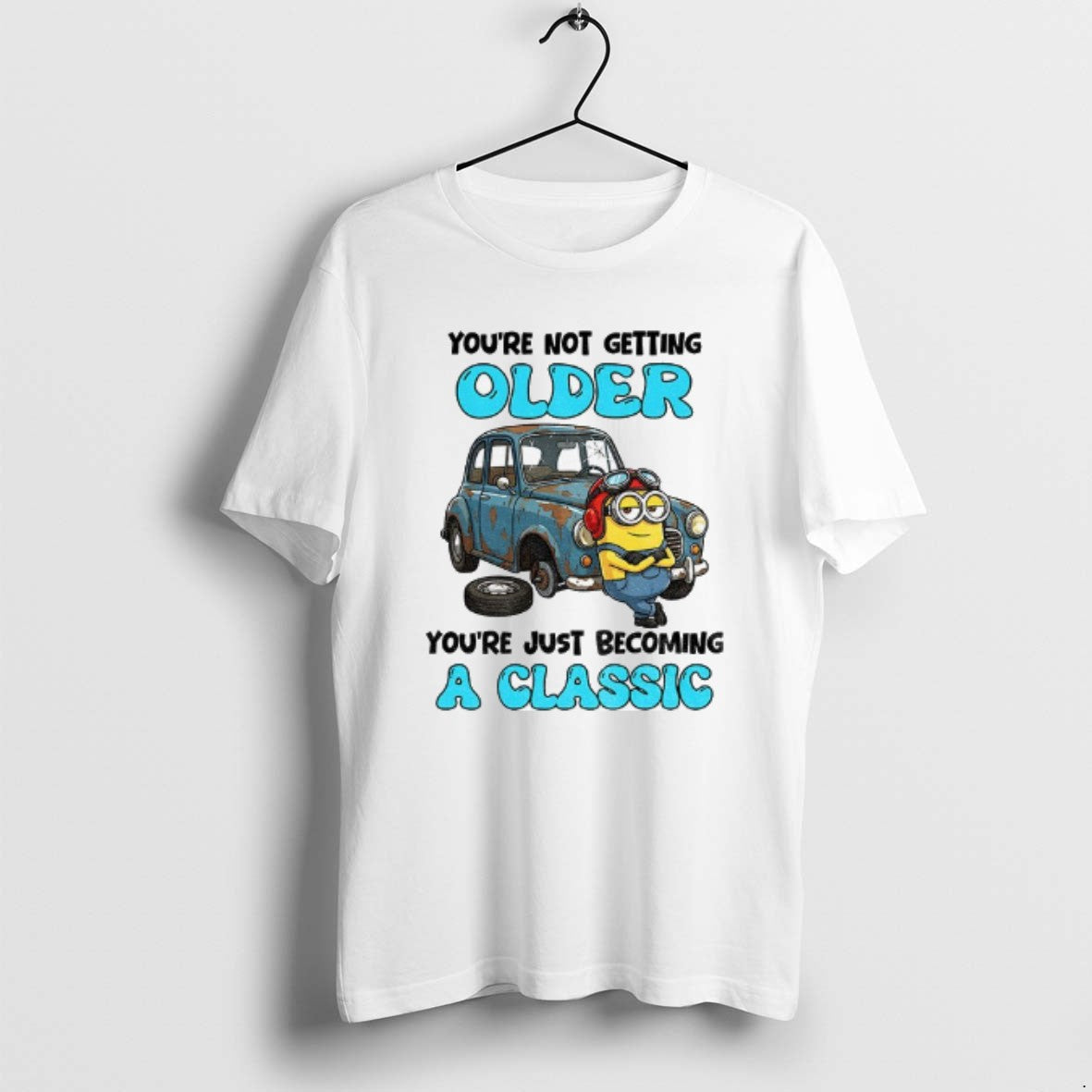 Official Minion Youre Not Getting Older Just Becoming - Adult & Kids T-Shirts, Sweatshirts & Hoodies apparel design preview 1