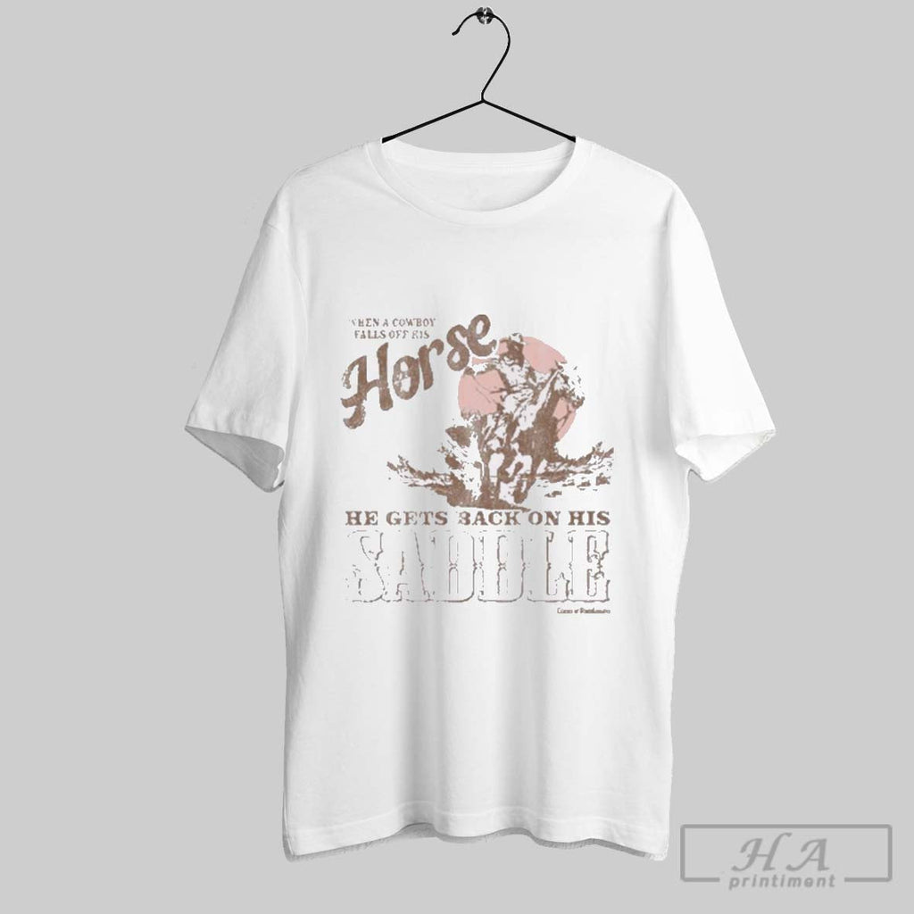 Official When A Cowboy Falls Off His Horse He Gets - Adult & Kids T-Shirts, Sweatshirts & Hoodies apparel design preview 1