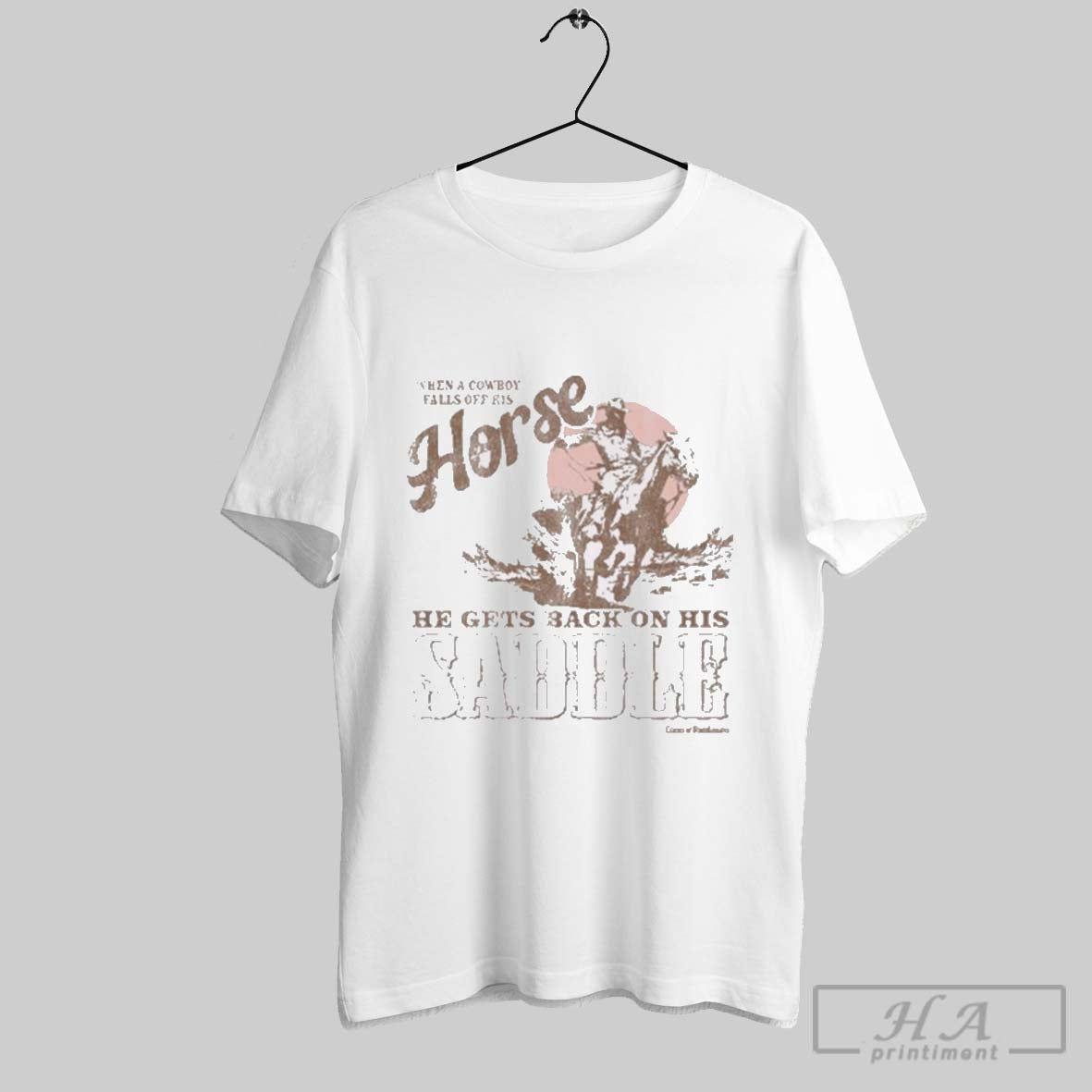 Official When A Cowboy Falls Off His Horse He Gets - Adult & Kids T-Shirts, Sweatshirts & Hoodies apparel design preview 1