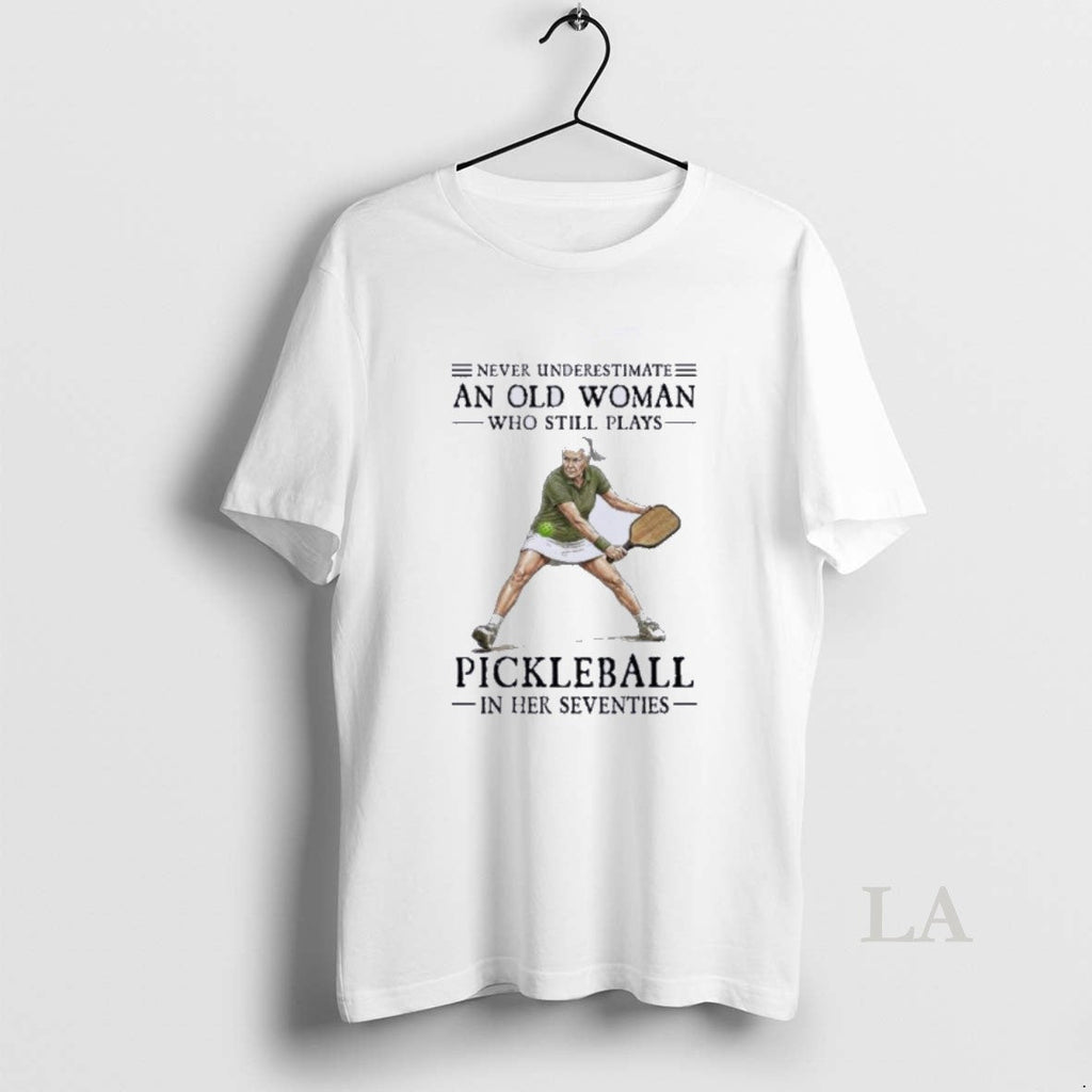 Original Never Underestimate An Old Woman Who Still - Adult & Kids T-Shirts, Sweatshirts & Hoodies apparel design preview 1