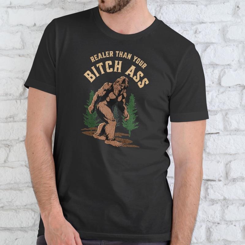 REALER THAN YOUR BIGFOOT Cotton Medium Size Bold Soft - Adult & Kids T-Shirts, Sweatshirts & Hoodies apparel design preview 1