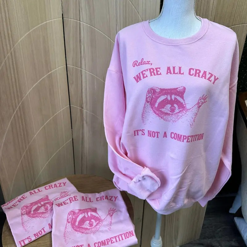 Relax We'Re All Crazy Raccoon Pink Trash Panda - Adult & Kids T-Shirts, Sweatshirts & Hoodies apparel design preview 1