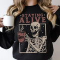 Staying Alive Coffee Funny Skeleton Halloween Vintage - Adult & Kids T-Shirts, Sweatshirts & Hoodies apparel design preview 1