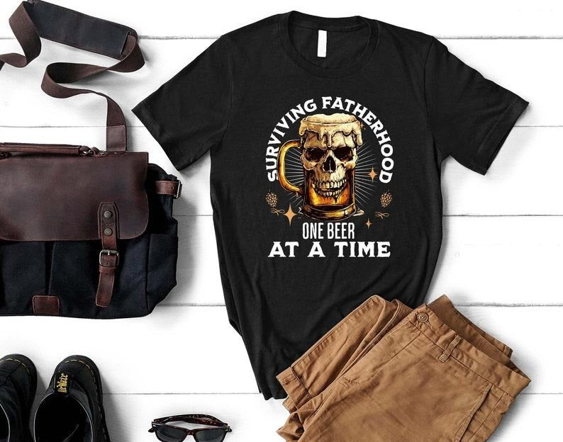 Surviving Fatherhood One Beer Time Craft Lover Funny - Adult & Kids T-Shirts, Sweatshirts & Hoodies apparel design preview 1