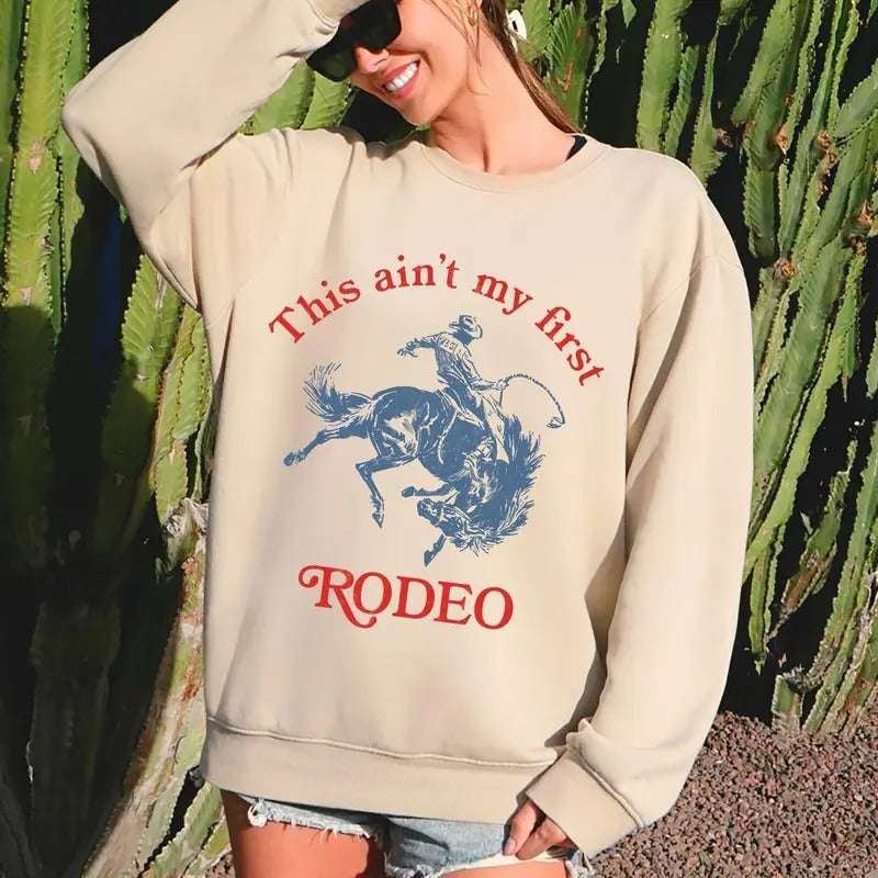 This Ain'T My First Rodeo Country Sassy - Adult & Kids T-Shirts, Sweatshirts & Hoodies apparel design preview 1