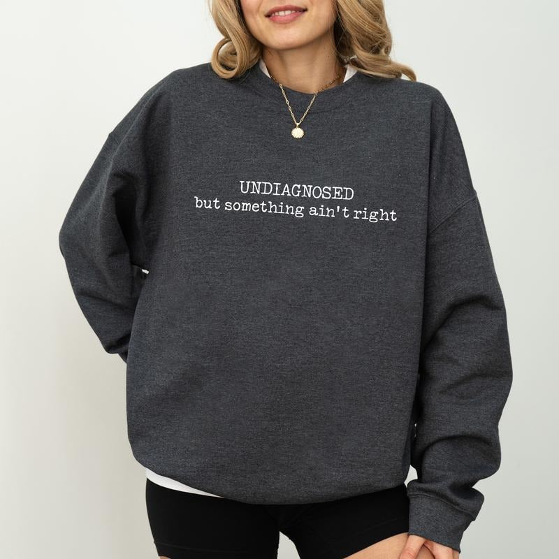 Undiagnosed But Something Ain'T Right Funny Sayings - Adult & Kids T-Shirts, Sweatshirts & Hoodies apparel design preview 1